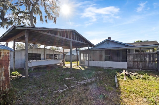 view of yard with a sunroom