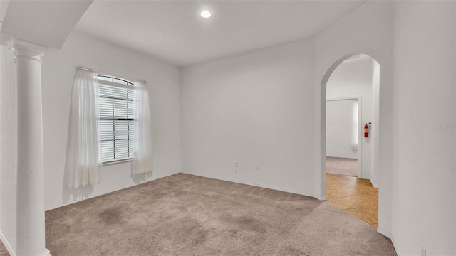 view of carpeted spare room