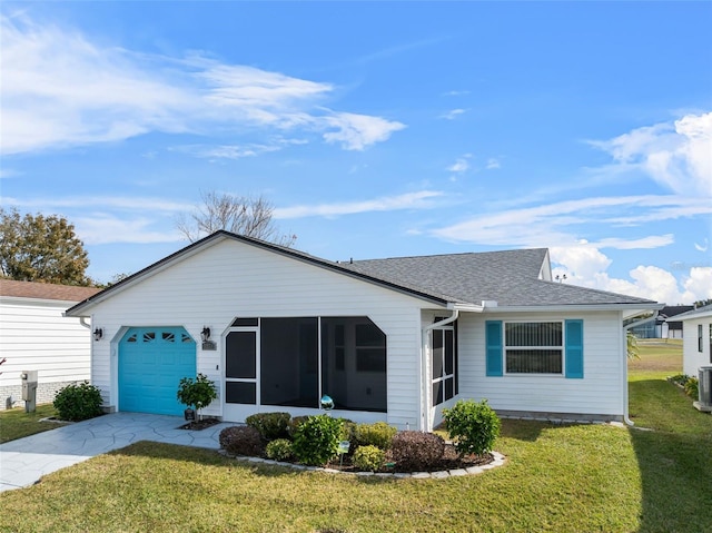 ranch-style home with central AC unit, a sunroom, a garage, and a front lawn