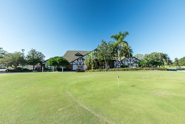 view of community featuring a lawn