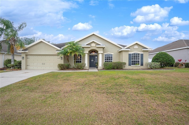 ranch-style home featuring a front yard and a garage