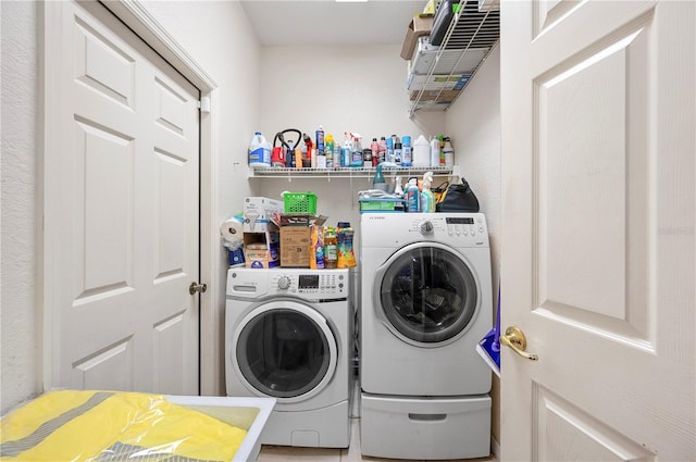 laundry area featuring washer and clothes dryer