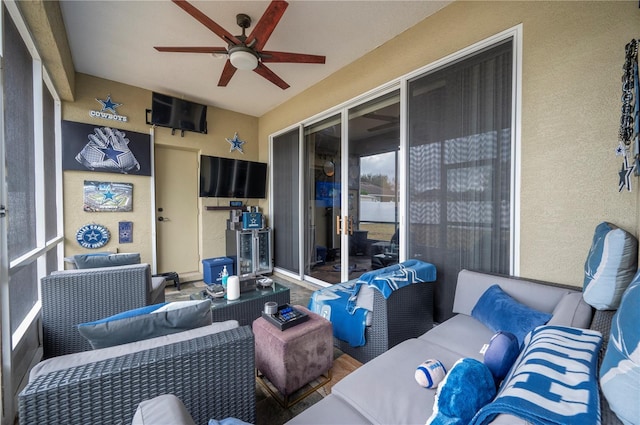 view of patio / terrace featuring an outdoor living space and ceiling fan