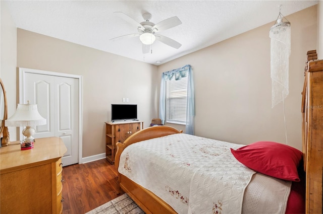 bedroom featuring ceiling fan and hardwood / wood-style floors