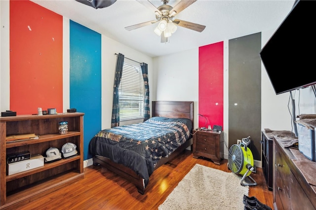 bedroom featuring ceiling fan and wood-type flooring