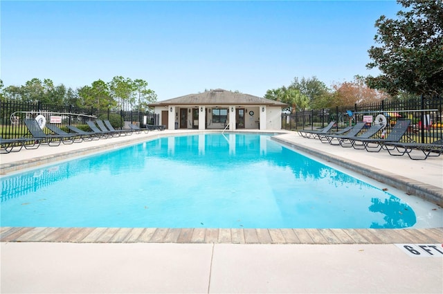 view of swimming pool featuring a patio