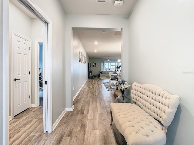 corridor featuring light wood-type flooring