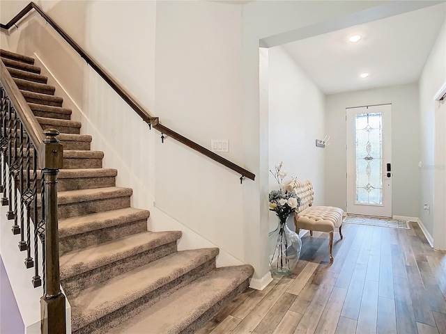 entryway featuring a healthy amount of sunlight and wood-type flooring