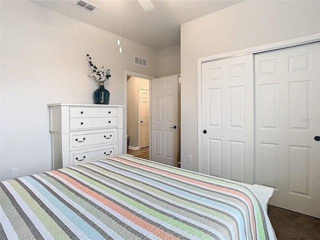 bedroom featuring ceiling fan and a closet