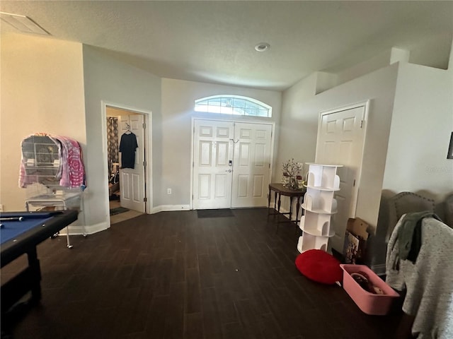 foyer featuring dark hardwood / wood-style floors and pool table