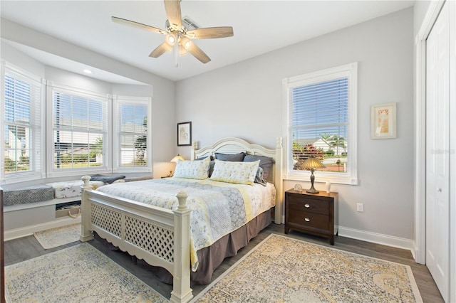 bedroom featuring hardwood / wood-style flooring and ceiling fan