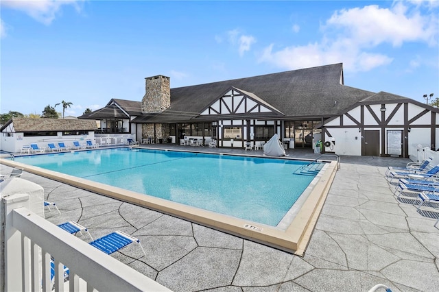 pool featuring a patio area