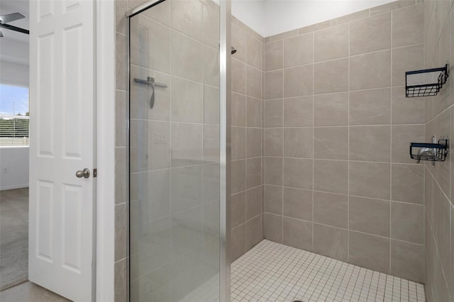 bathroom with tiled shower