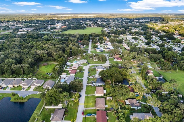 bird's eye view with a water view and a residential view