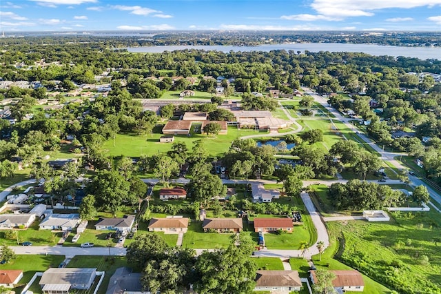 aerial view with a water view and a residential view