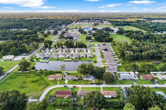 bird's eye view featuring a water view and a residential view