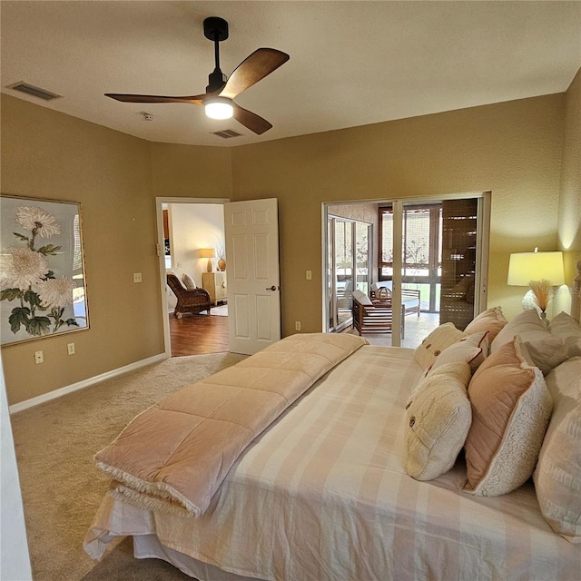 carpeted bedroom featuring a ceiling fan, access to exterior, visible vents, and baseboards