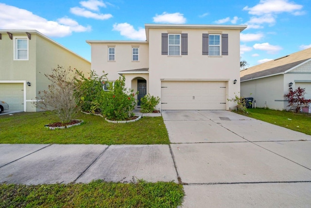 front of property featuring a garage and a front lawn