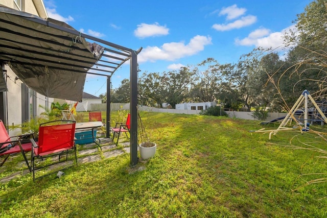 view of yard with a pergola