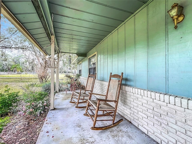 view of patio featuring a porch