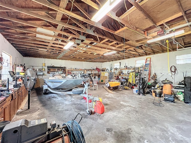 garage with a workshop area