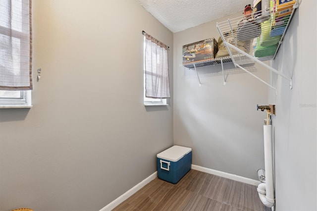 washroom with a textured ceiling