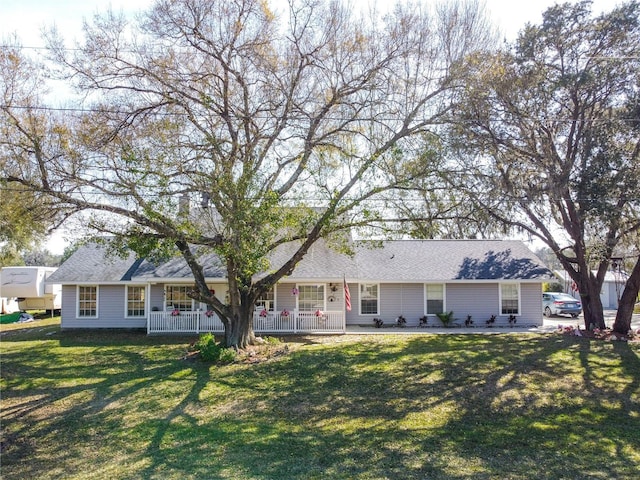 single story home featuring a front yard