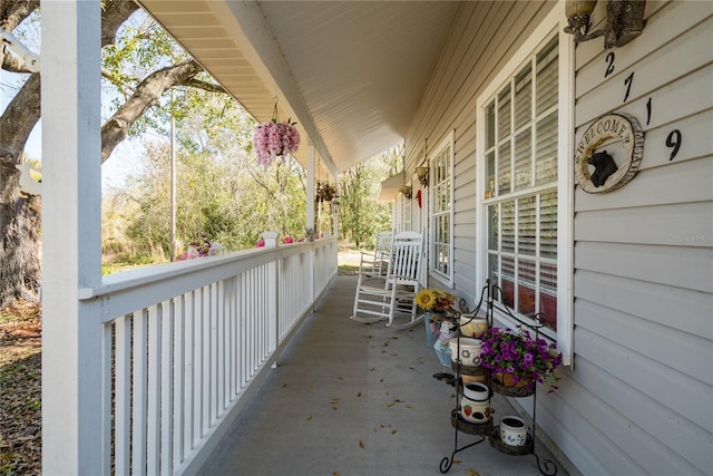 balcony featuring a porch