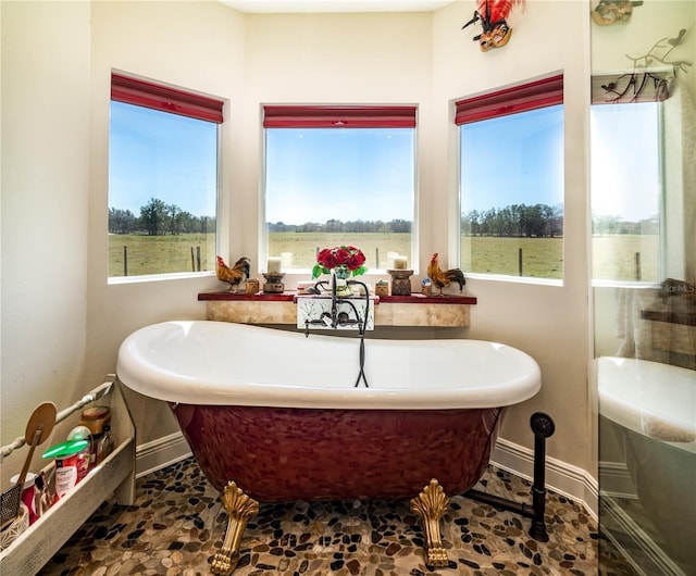 bathroom featuring a tub to relax in