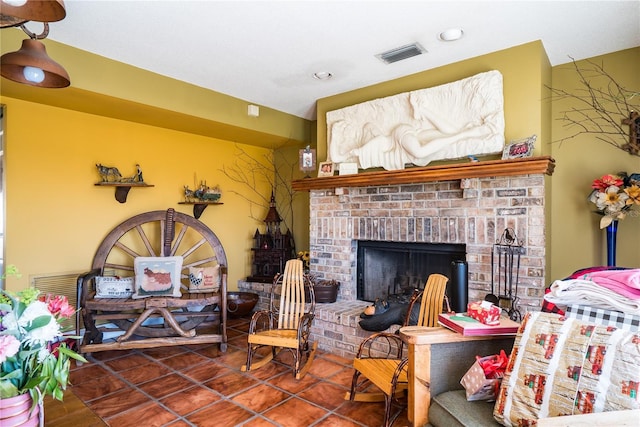 tiled living room featuring a fireplace