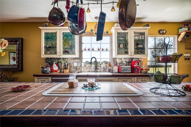 kitchen featuring sink and tile counters