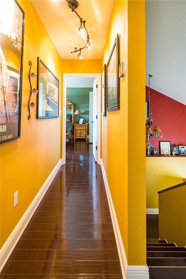 hallway featuring dark wood-type flooring