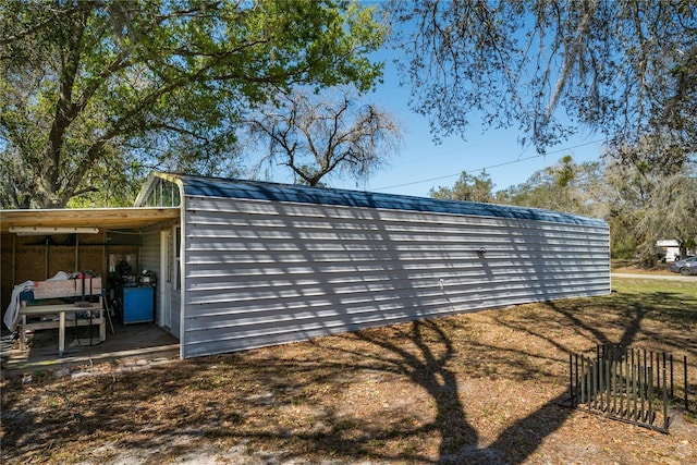 view of outdoor structure featuring a carport