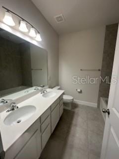 bathroom featuring toilet, tile patterned flooring, and vanity