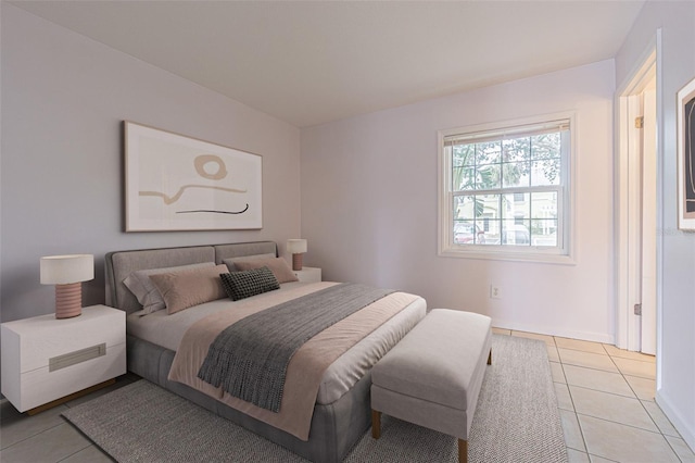 bedroom featuring light tile patterned floors