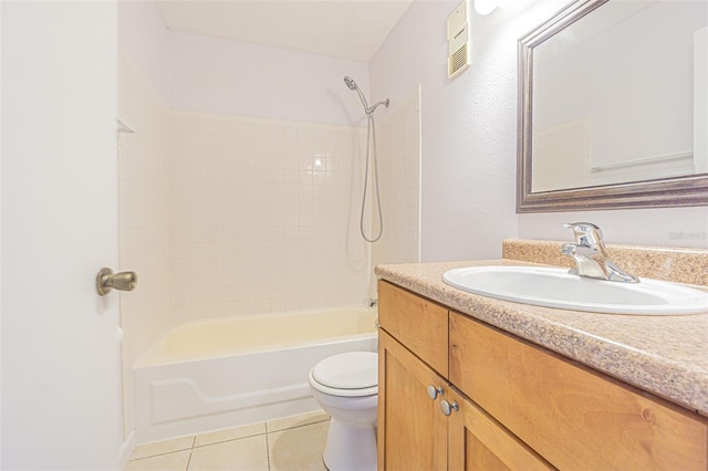 full bathroom with vanity, tile patterned floors, toilet, and tiled shower / bath