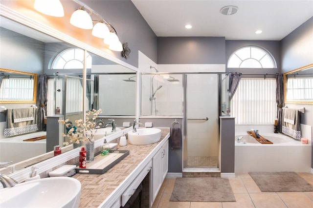 bathroom with vanity, separate shower and tub, and tile patterned floors