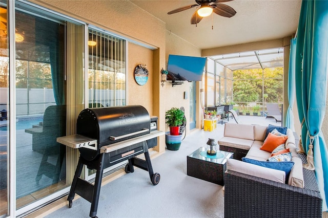 interior space with ceiling fan