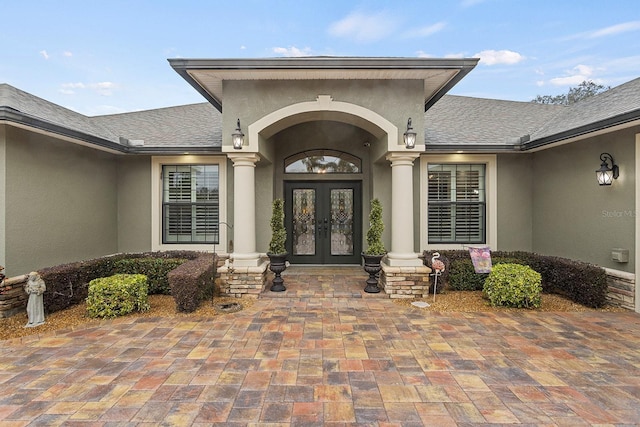 property entrance featuring french doors