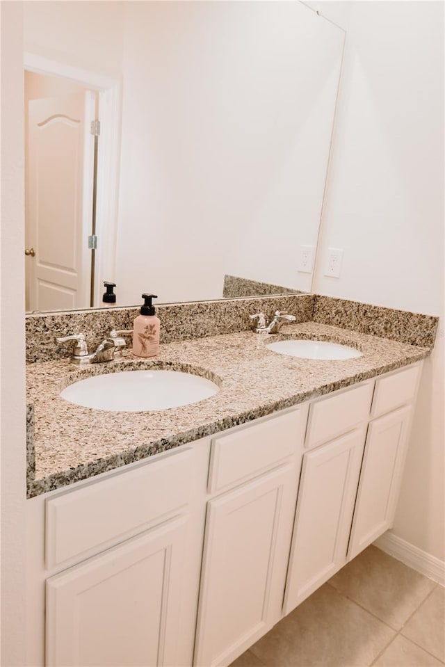 bathroom featuring vanity and tile patterned floors