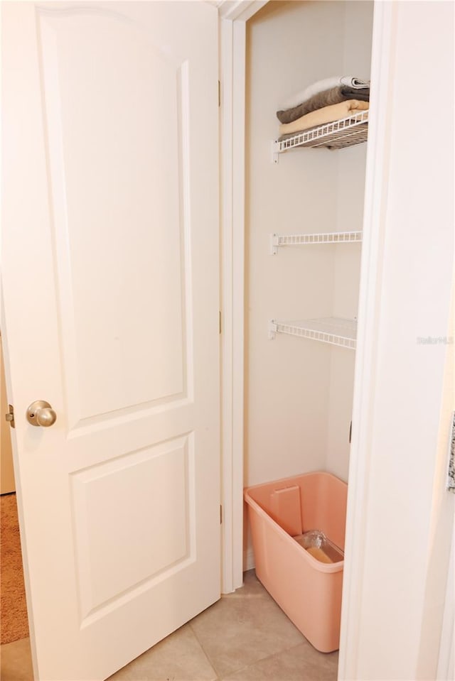 bathroom with tile patterned flooring