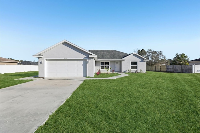 ranch-style home with a garage and a front yard