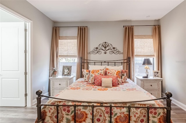 bedroom with light hardwood / wood-style flooring