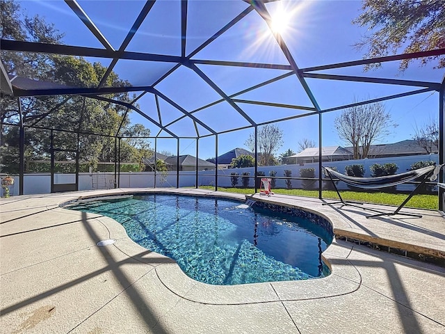 view of pool featuring a lanai and a patio area