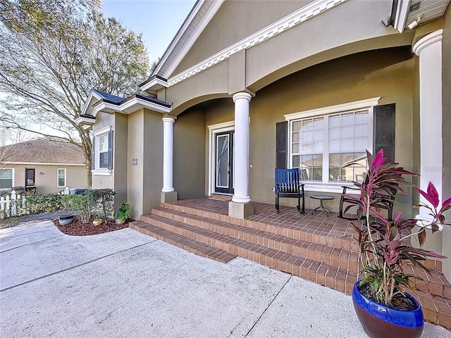 entrance to property with covered porch