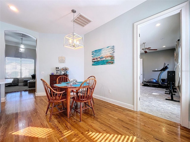 dining room featuring ceiling fan and wood-type flooring