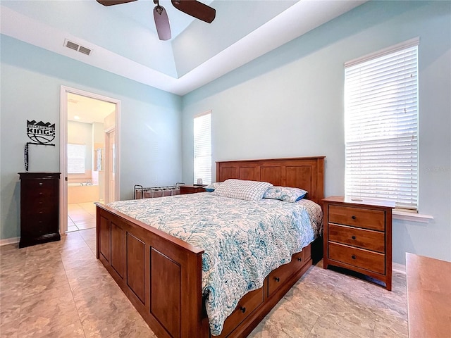 bedroom featuring ceiling fan and ensuite bathroom