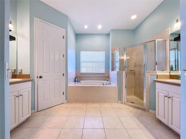 bathroom with vanity, separate shower and tub, and tile patterned floors