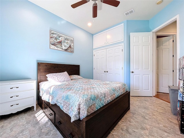 bedroom featuring ceiling fan and a closet