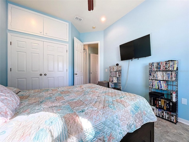 bedroom featuring ceiling fan and a closet